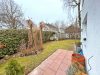 Familien aufgepasst - Erdgeschosswohnung mit Süd-Terrasse, Gartenanteil und Garage - Bild