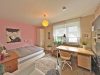 Familien aufgepasst - Erdgeschosswohnung mit Süd-Terrasse, Gartenanteil und Garage - Bild