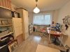 Familien aufgepasst - Erdgeschosswohnung mit Süd-Terrasse, Gartenanteil und Garage - Bild