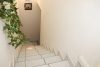 Vermietet: Traumhafte 4-Zi-Wohnung mit 300 qm Garten in Trudering - Treppe Richtung Hobbykeller
