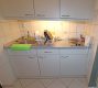 1-Zimmer-Appartment mit guter Anbindung in Ottobrunn - Küchenzeile